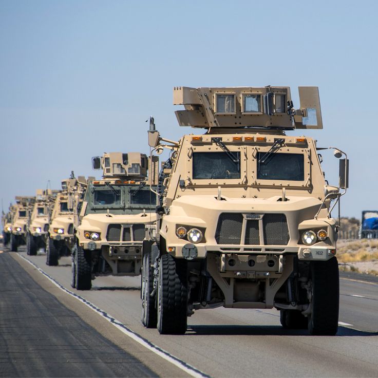 Convoy of armoured tactical vehicles