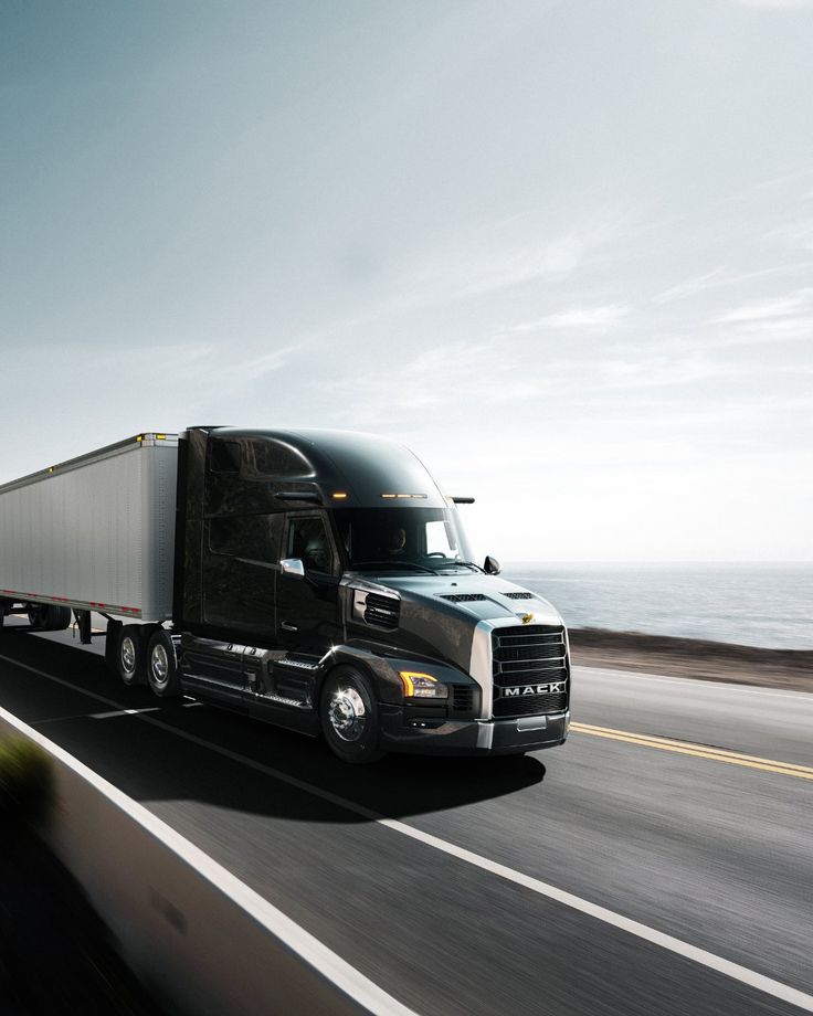 Mack semi truck on a coastal highway
